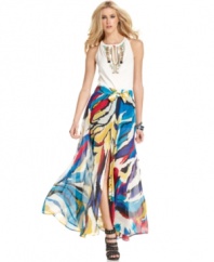 A brightly bold abstract-animal print makes a summer statement on this Andrew Charles maxi skirt -- elevate it with platforms for soiree style!