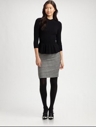 Leave it to houndstooth to add timeless charm to the classic pencil skirt.Solid waistbandWaist dartsBack zipperAbout 21 long52% rayon/48% woolDry cleanImported Model shown is 5'11 (180cm) wearing US size 4. 