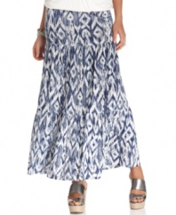 A two-tone ikat print makes a fresh statement on Cha Cha Vente's tiered maxi skirt. Complete the look with metallic sandals for a glam-meets-boho look.