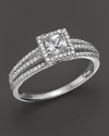 Elegant ring with princess-cut center stone micro-pave diamond trim.