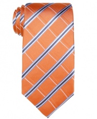 A big, bold pattern in a bright color palette gives this Tasso Elba tie instant presence.