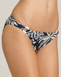 Bring a denim look to the poolside with this Ralph Lauren Blue Label bikini bottom, accented with bright white jute-wrapped O-rings and a tropical print.