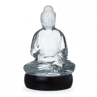 An exquisite, limited edition crystal idol of the Buddha seated in lotus position exudes a meditative calm for a dose of serenity and shimmering opulence.