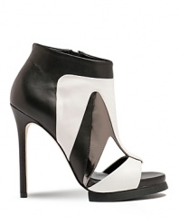 A sandal-bootie hybrid, Camilla Skovgaard's Eye Cut sandals boast a color block design in desaturated shades.