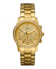 With elegant style and sparkling accents, this gorgeous GUESS watch is good as gold.