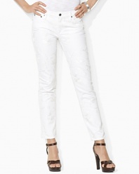 A chic skinny silhouette lends contemporary polish to a unique embroidered denim jean, rendered with a hint of stretch for a flattering fit.