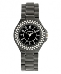 Style&co. lights up the dark with this lovely watch. Hematite tone mixed metal bracelet and round case. Bezel embellished with crystal accents. Glossy black dial features applied silver tone numerals, minute track, three hands and logo. Quartz movement. Splash resistant. Two-year limited warranty.