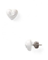 Fall for Juicy Couture's on-trend love tokens. In a bright white shade, these heart-shaped studs march to a bold beat.