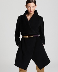 A soft cashmere Donna Karan New York coat is the luxe addition to your winter wardrobe, elevating your every day with chic. A concealed closure at the side lends a polished look while a self belt cinches the silhouette so your figure remains defined.