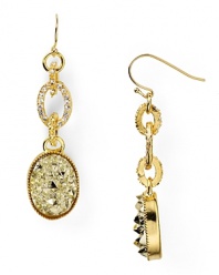 Delicately adorned with hammered stones, this pair of dangle earrings from Aqua lend effortless glamor to every look.