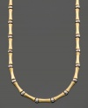 Simple style with a touch of the exotic. This bamboo necklace is crafted in 14k gold and sterling silver over sterling silver. Approximate length: 16 inches.