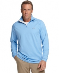 From the course to the clubhouse, you'll stay polished in the performance jersey of this moisture-wicking quarter-zip pullover from Greg Norman. (Clearance)