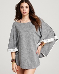 Heathered jersey meets crochet lace in Lucky Brand's poncho coverup. Balance the casual elegance with chic designer sunnies and delicate flat sandals.