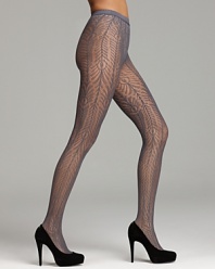 A peacock pattern flatters the legs in these stretchy net tights from Wolford.