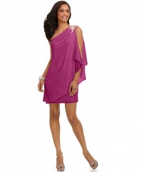 Channeling goddess-inspired glamour, this airy one-shoulder draped dress from JS Boutique makes a striking impression.