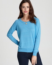 Update your essentials with this ALTERNATIVE pullover, cut in a comfy-cool silhouette and fashioned in a pop-bright hue.