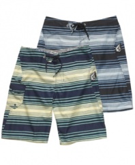 Hit the sand in style. These Volcom board shorts give you the rad striped style you want.