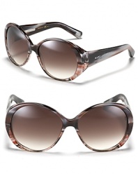 MARC BY MARC JACOBS' timeless oversized sunglasses boast elegant appeal.