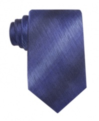 With subtle dimension, this tie from John Ashford is a modern update for a traditional solid tie.