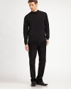 A sophisticated layer with a ribbed mockneck collar in soft merino wool.Ribbed mockneck collarLong sleeves with ribbed cuffsRibbed hemMerino woolDry cleanImported