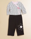 Bold, beautiful daisies adorn the bodysuit and pants of this plush cotton two-piece set with snaps and and elastic waistband. Bodysuit V-neckLong sleevesFront snapsBottom snaps Pants Elastic waistbandCuffed hemCottonMachine washImported Please note: Number of buttons/snaps may vary depending on size ordered. 