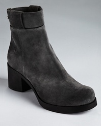 CoSTUME NATIONAL stays ahead of the curve with the Ziggy ankle boots--a fashion-forward style showcasing a runway-worthy look in a thick, chunky silhouette.