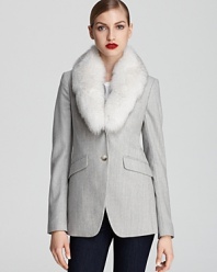 A removable plush fur collar brings versatility and luxury to this impeccably tailored Theory jacket.