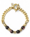Vanessa Mooney makes the classic chain link bracelet feel completely cool with boldly colored beads.