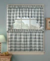 Get your country home in check with Rowan Plaid café curtains. A classic pattern in soothing slate or gold tailors the room with effortless charm. Dyed yarns filter light to keep out the summer sun.