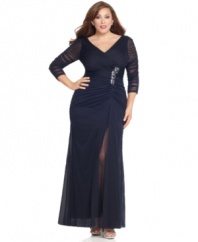 This plus size evening gown by Adrianna Papell sparkles in the spotlight of a special occasion with flattering ruching and jeweled detailing.
