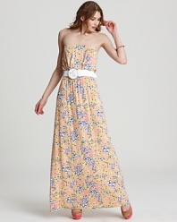 Everyone loves a dress that looks just as good as a cover-up on the beach as it does at a formal garden party, that's why this bright Lilly Pulitzer floral maxi is in high demand with the style set.