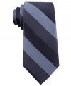 Bold stripes make a big statement in any guy's work wardrobe. Make it count with this DKNY tie.
