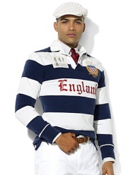 A traditional rugby shirt is cut for a trim, modern fit with athletic details and a bold flag patch, celebrating Team USA's participation in the 2012 Olympic Games.