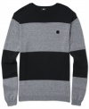 Get ready to pull out the big dogs. When the weather turns, this sweater from DC Shoes is ready to keep you warm in style.