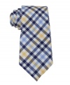 Bring classic country to the corner office with this fresh gingham skinny tie from Tommy Hilfiger.
