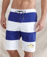 Buoy your beach style with these swim trunks from Tommy Hilfiger.