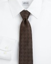 Expertly crafted in Italian silk and finished in a handsome houndstooth pattern.About 3 wideSilkDry cleanMade in Italy