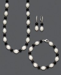 Show your true colors in contrasting style. This chic, jewelry set features a necklace, bracelet and pair of earrings that all highlight cultured freshwater pearls (7-8 mm) and bold onyx gemstones (52 ct. t.w.) in an alternating pattern. Set in sterling silver. Approximate necklace length: 18 inches. Approximate bracelet length: 7-1/2 inches. Approximate earring drop: 2 inches.