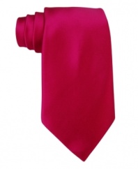 Cool confidence isn't about shrinking into the shadows, it's all about marching to the office with the can-do attitude afforded by this bold solid tie from Donald Trump.