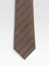 A handsome look woven with bold stripes in fine Italian silk.SilkDry cleanMade in Italy